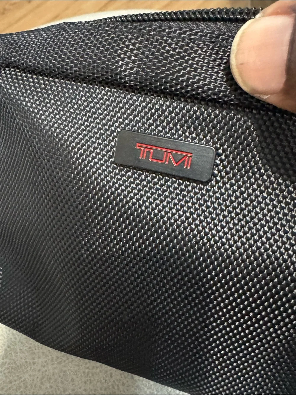 Tumi Black Nylon Toiletry Kit with Red Logo Accent